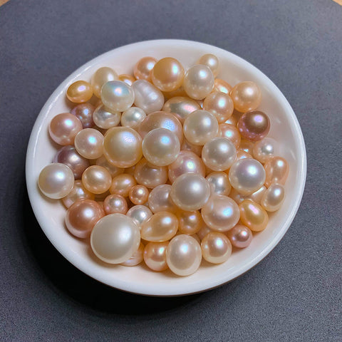 Live N Normal Farmed Pearls( Regular oysters .there are 20-30pcs pearls)
