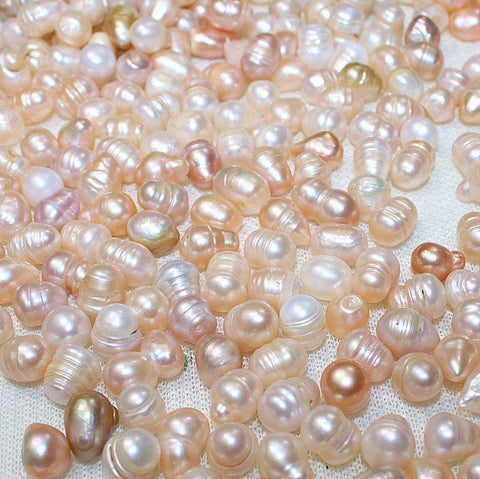 Live N Normal Farmed Pearls( Regular oysters .there are 20-30pcs pearls)